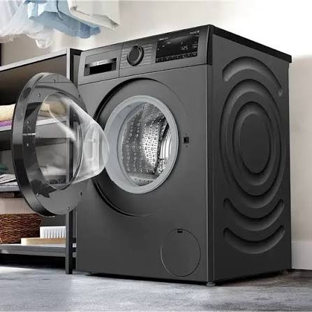 Technician-serviced front load washing machine at a home in Bangalore